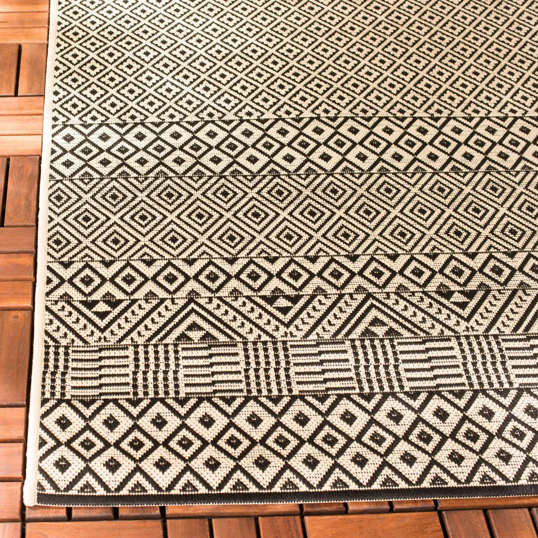 Arneshia Geometric Beige Indoor / Outdoor Area Rug Wade Logan® Rug Size: Runner 2'3" x 6'7"
