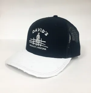 Black cap with white half quill ostrich visor