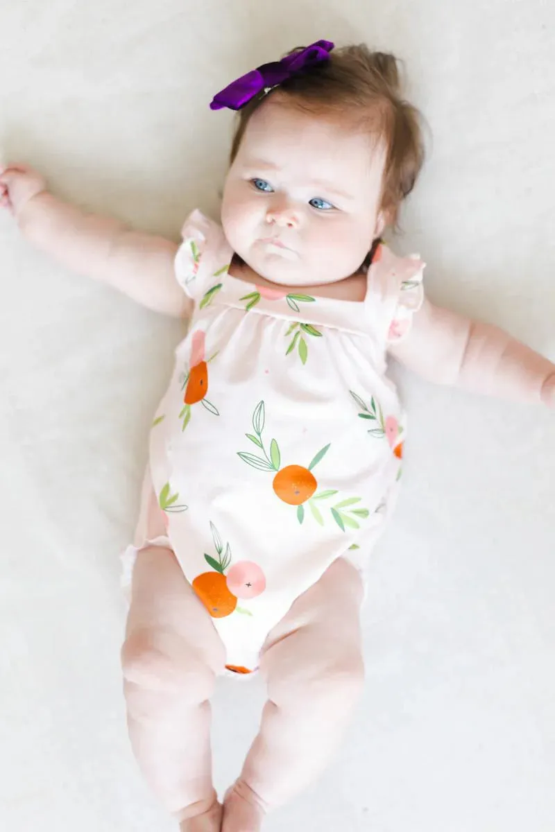 Mila & Rose Tangerine Ruffle Cross Back Romper