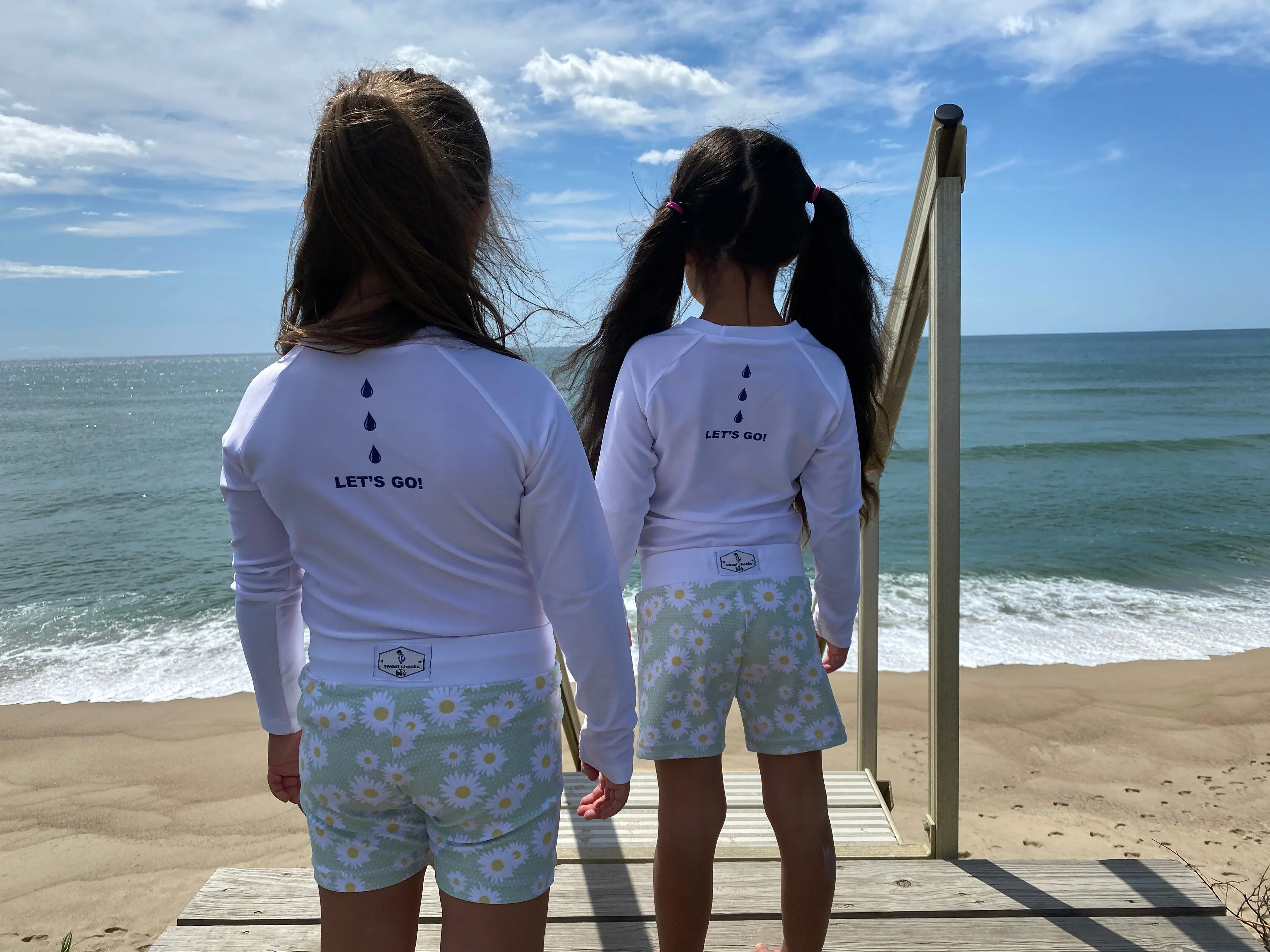 sweet cheeks rash guard